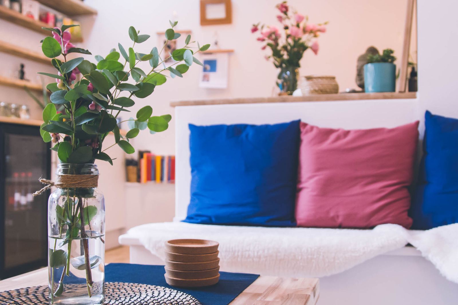 The lounge at the Coach House, with cushions and fresh flowers
